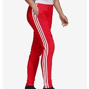 Women red adidas pants ( runs big fits as a medium